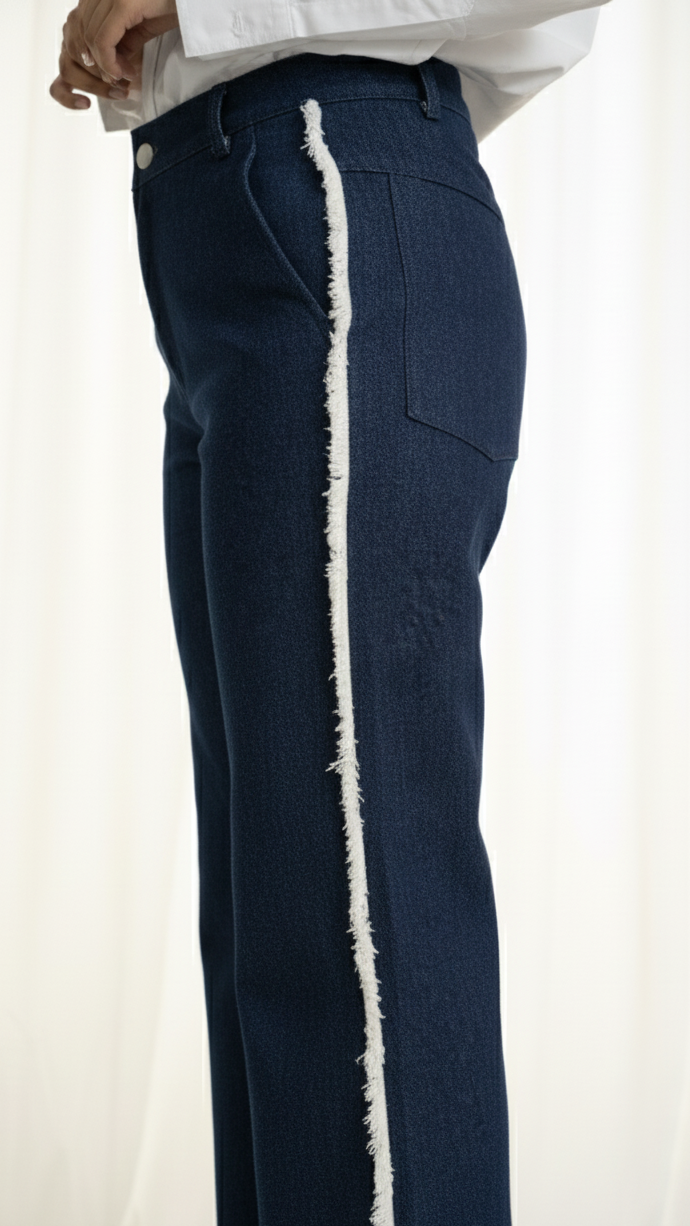Navy pants with white trim on a plain background